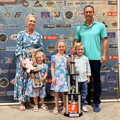 The Cagle family with Sullivan's Florida BMX state championship trophy