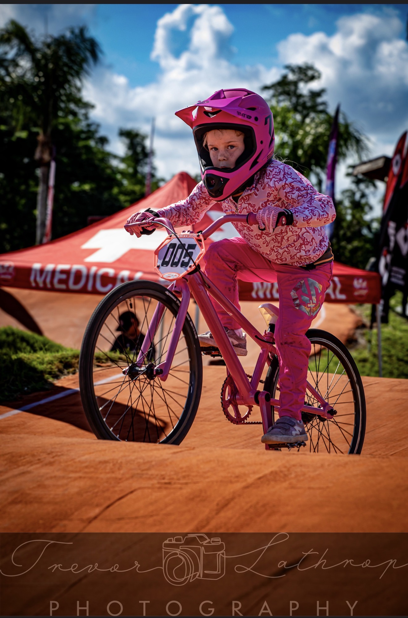 Sage Cagle racing number 005 on her pink BMX bike